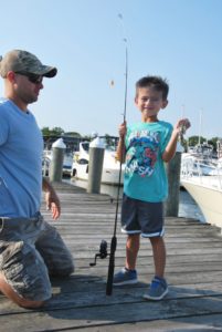 little-boy-fishing-on-dock