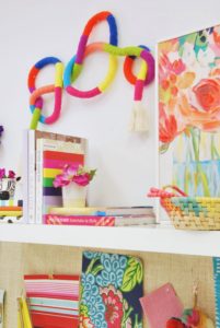 colorful-room-setting-with-yarn-wall-hanging