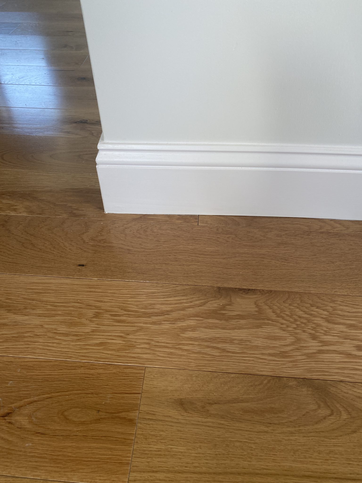 baseboard-and-hardwood-flooring-detailing