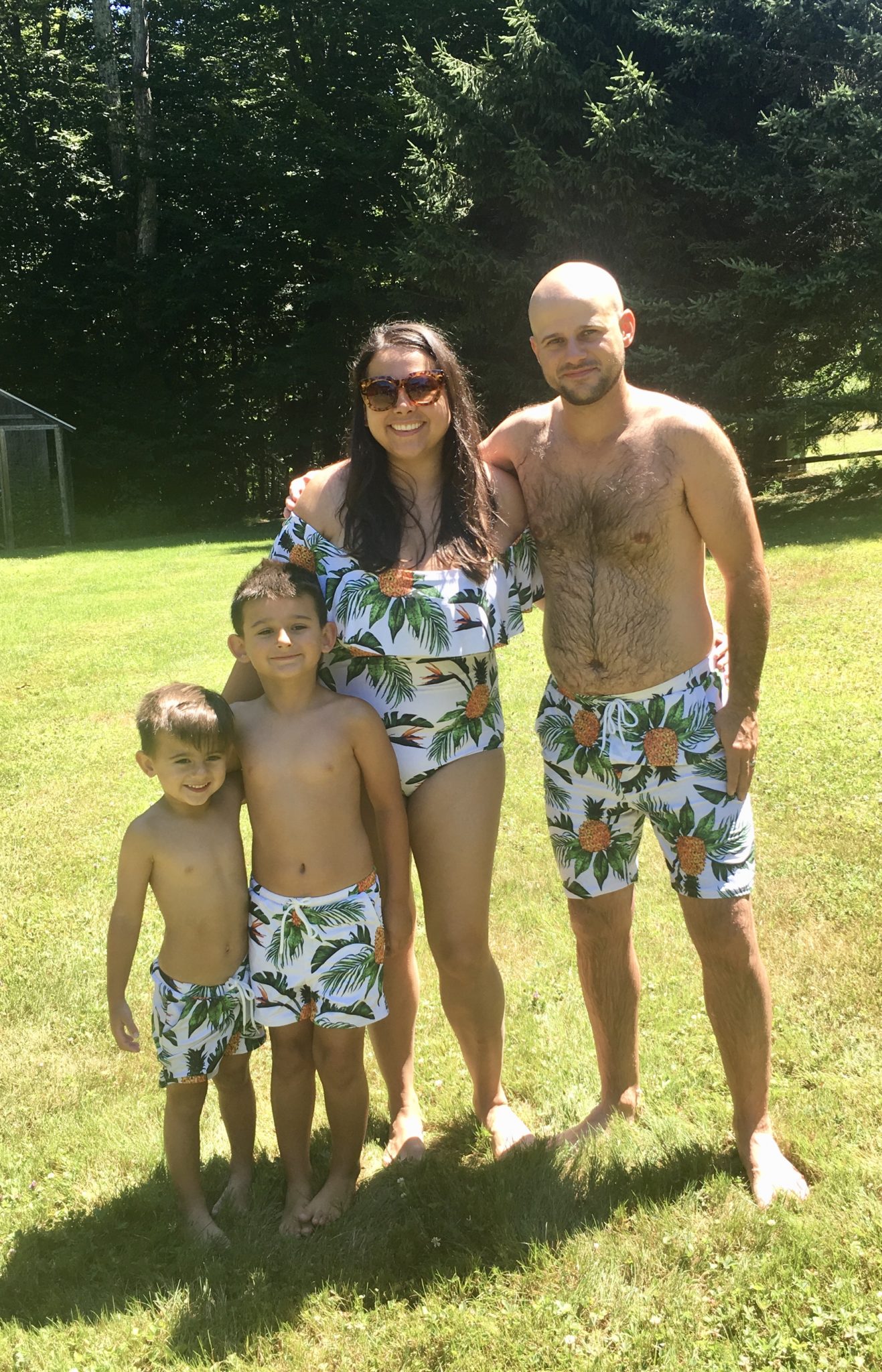family-in-matching-pineapple-bathing-suits
