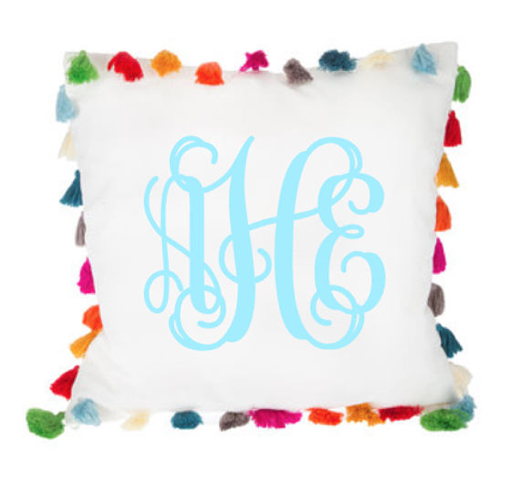 tassel pillow with colorful monogram