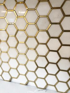 jeffrey-court-brass-and-marble-hexagon-tile