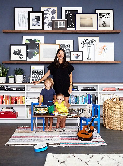 one kings lane_rebecca minkoff_FAMILY PORTRAIT IN FRONT OF GALLERY WALL