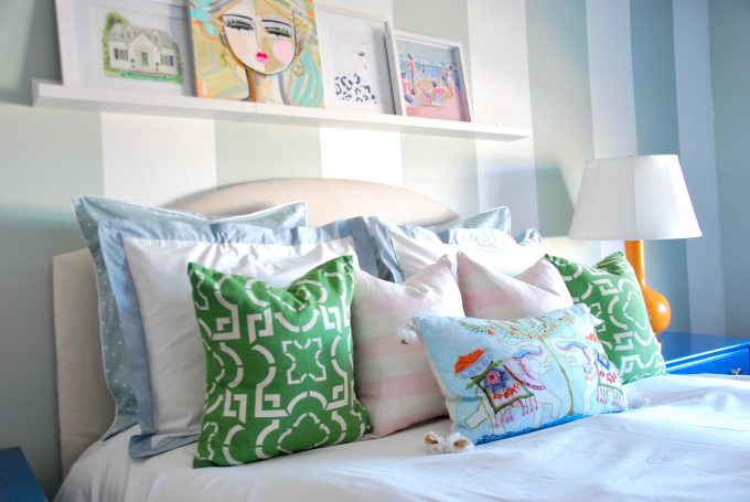 pink, green, blue pillow display