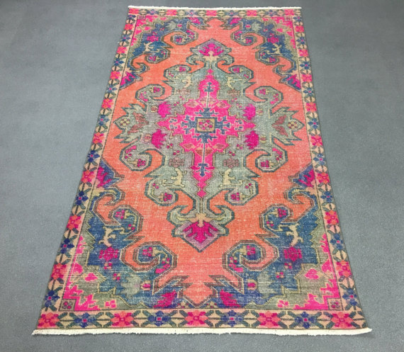 pink and orange vintage oushak rug