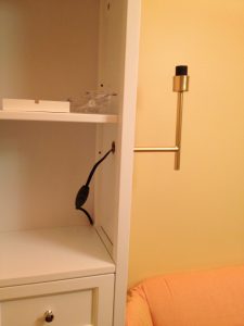 how to hide plug in sconce wires