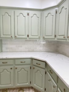 remodeled-kitchen-with-new-paint-tile-and-backsplash