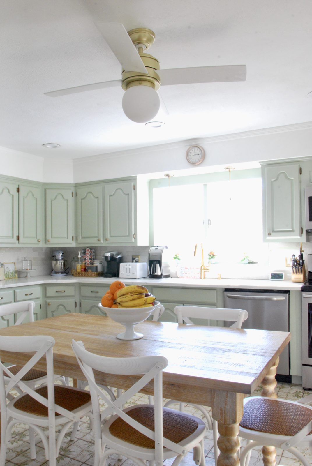 bright-and-airy-kitchen-with-light-green-cabinets